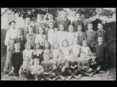 children and Miss Lindsay (9KB); click for larger version (120KB)
